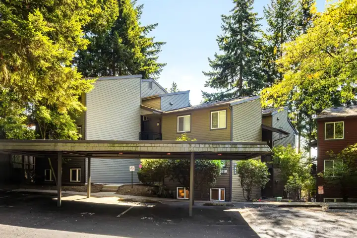 Welcome to this well-maintained, tree-lined community featuring updated siding, windows, and roofs. Enjoy the convenience of your deeded covered parking spot.