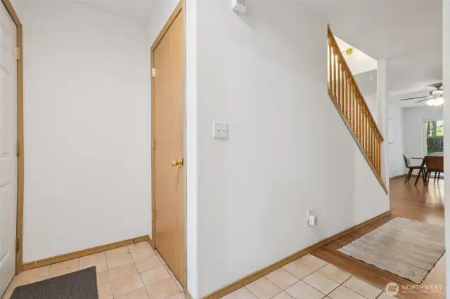 A coat closet is conveniently located by the main entrance with additional under the stairs storage.