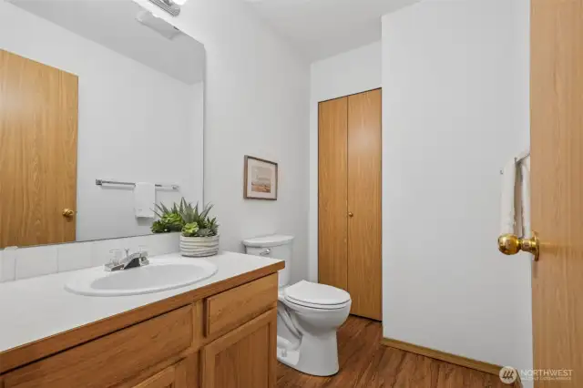 The guest half bathroom is located on the main level.