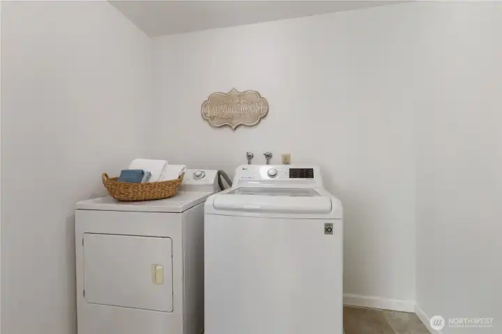 Utility room located upstairs.