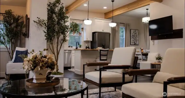 Well lit living room much larger then it appears