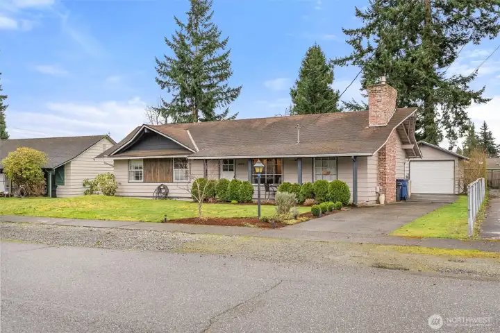 Welcome Home!  Updated Marysville rambler with covered front porch, detached garage, long driveway, mature landscaping, spacious lot featuring a large front yard and inviting curb appeal.