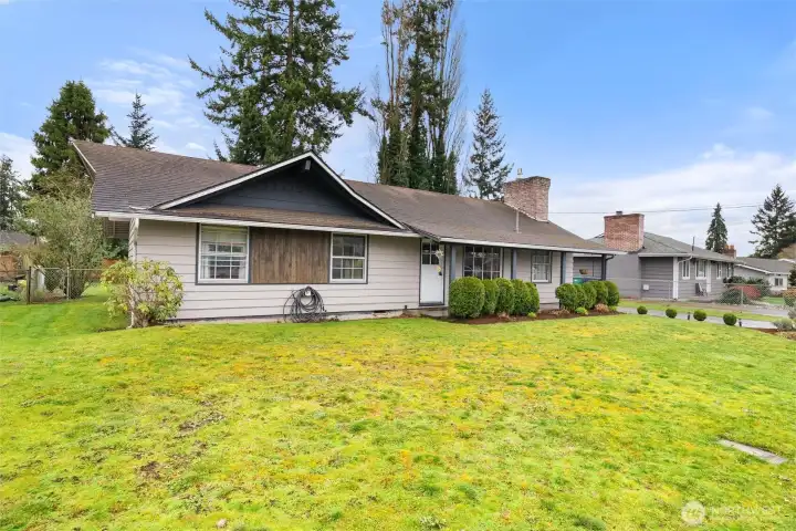 Front Yard -   Spacious front yard with refreshed landscaping and a clean, welcoming presentation.