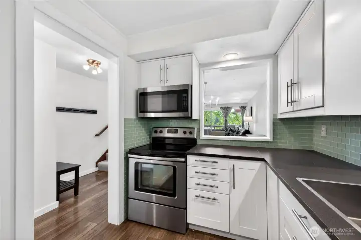 Kitchen    Updated kitchen with countertops, stainless steel appliances, ample cabinet storage, and functional prep space designed for everyday living. Open layout connects effortlessly to the main living areas, making it ideal for hosting guests or enjoying casual meals. Popular features buyers want including modern finishes, efficient design, and easy maintenance.