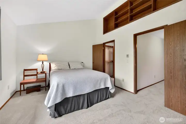 Primary Bedroom    Spacious primary suite offering privacy, comfort, and generous closet space. Large windows create a light-filled retreat with room for a king-sized bed, additional seating, or home office setup. Ideal for buyers seeking a relaxing primary bedroom with functional storage and flexible living options.