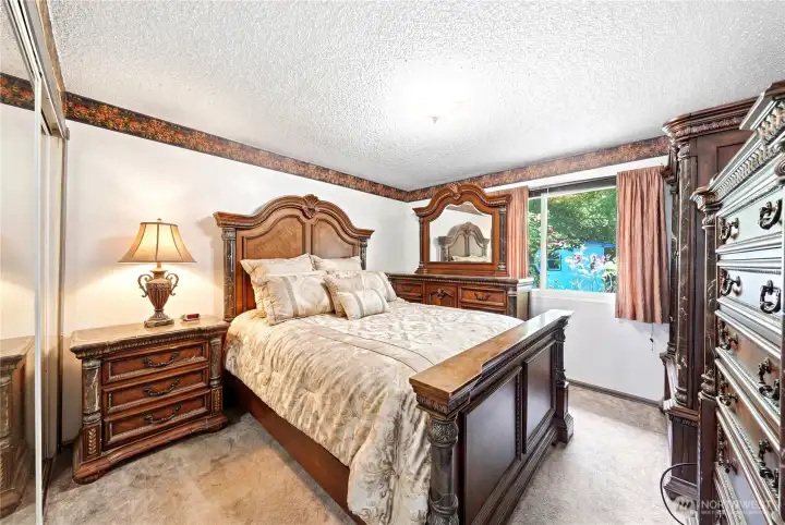 primary bedroom - virtually staged bed