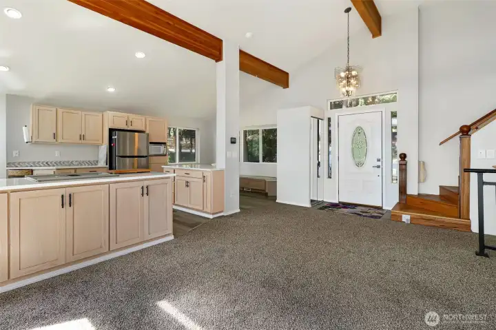 Exposed wood beams, maple colored cabinets, a plethora of counter space, very nice. Exposed wood beams, maple colored cabinets, a plethora of counter space, very nice.