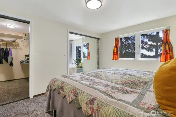 Primary bedroom with walk in closet Primary bedroom with walk in closet