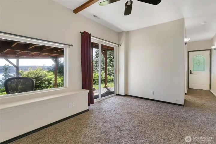 Entrance to adu to the right, plus sliding glass door to covered patio to enjoy your view. Entrance to adu to the right, plus sliding glass door to covered patio to enjoy your view.