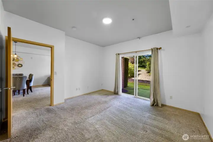 Sliding glass door leading to covered outdoor patio