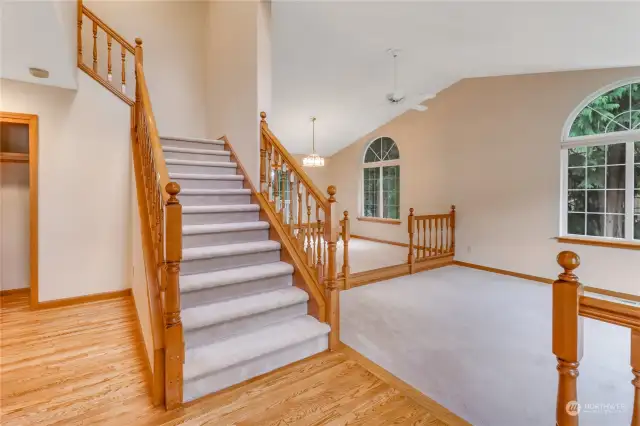 As you enter the home you will find a spacious home with vaulted ceilings and beautiful wood trim. The hardwood floors sparkle as they were recently refinished.