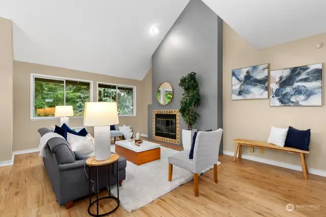 Living area features vaulted ceilings.