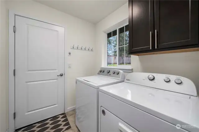 Even the laundry room offers more storage space above the dryer.