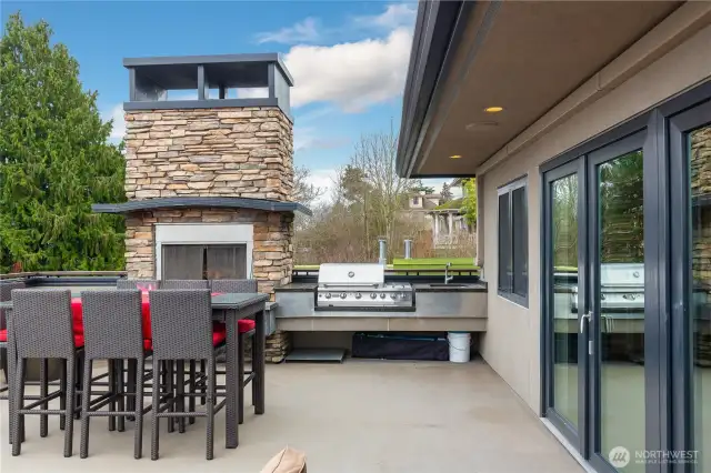 Upper deck includes wood burning fireplace (with gas starter), build-in premium BBQ