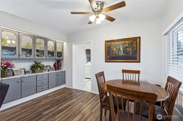 Dining area w/ beautiful refinished wall unit.