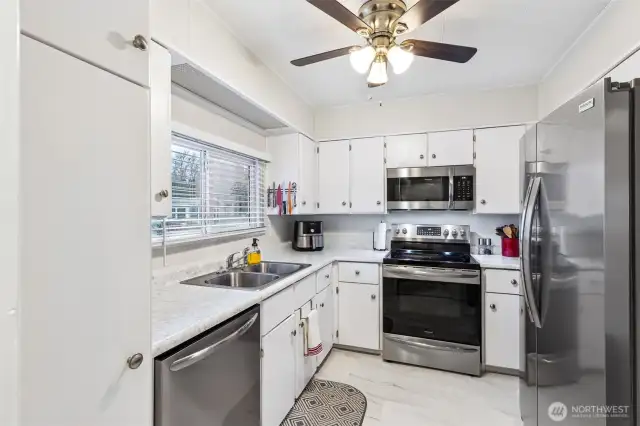 Included stainless steel appliances.