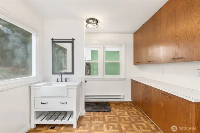 Mudroom/powder room with storage and easy access to the outdoor spaces.