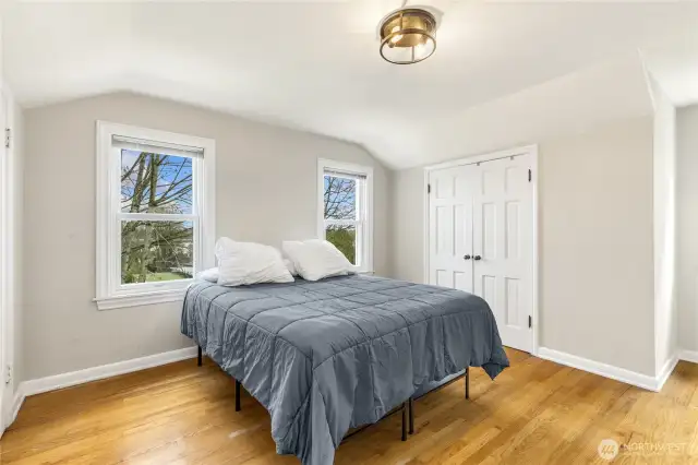 One of three upper level bedrooms. Bright and spacious with double closets.