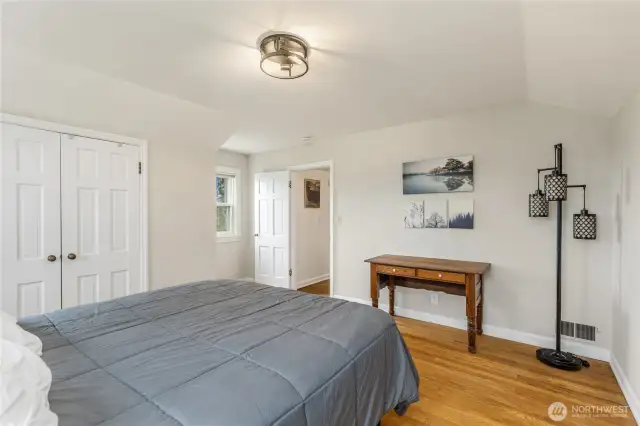 One of three upper level bedrooms.