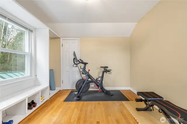 Bedroom that's currently functioning as a gym.