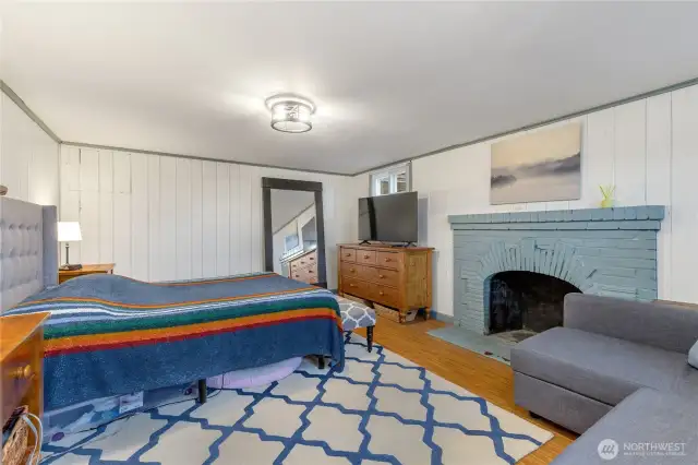 originally a family room... Now being used as a large bedroom with fireplace (non-conforming)