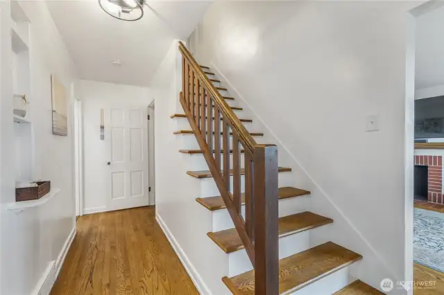 Front entry and staircase, Oak hardwoods and railing.