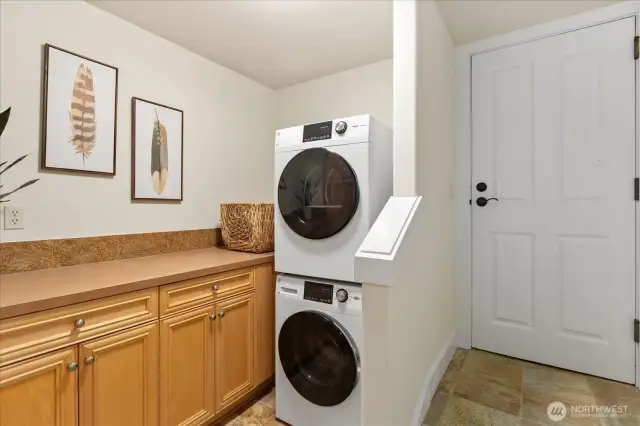 Additional counter and cupboard space with access to your own garage.