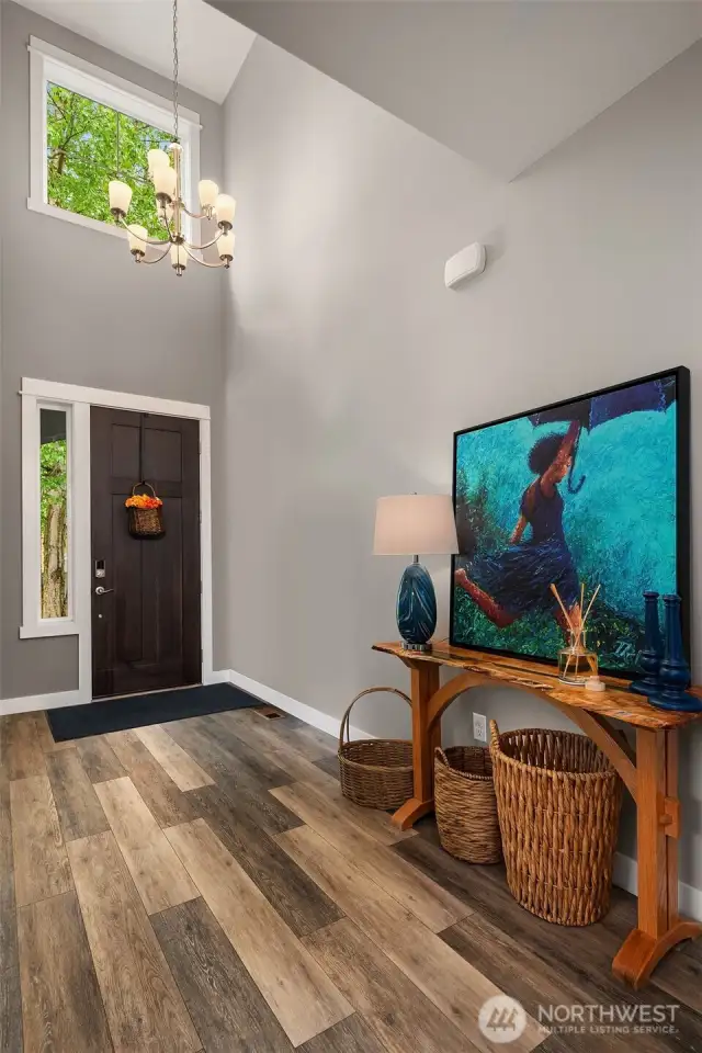 High ceilings & handsome flooring set the stage