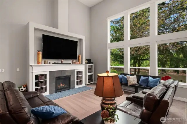Floor to ceiling windows draws nature into this fantastic space