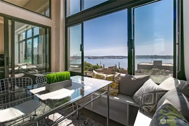 Fabulous and unique sunroom for soaking in the views over your morning coffee.