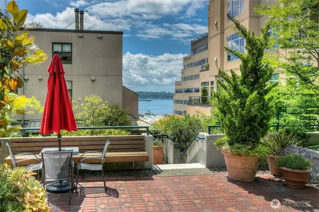 Enjoy lunch out in the courtyard overlooking the Bay. Steps lead to the Seattle Athletic Club.
