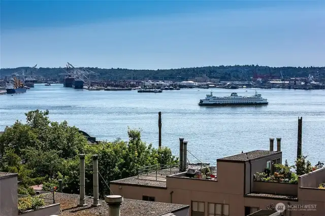Watch ferries sail in and out of the harbor....