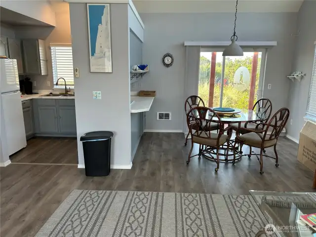 Kitchen and eating area.  All new applicances to include refrigerator, stove, dishwasher, and microwave.  All Frigidaire....