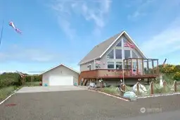 Day view with detached garage