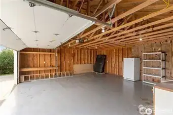Large two vehicle garage for parking and storage