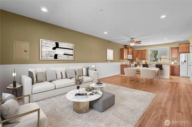 Lovely Great Room Concept! Laminate Hardwoods throughout the Living Room and Dining Room. (Virtual Staging)