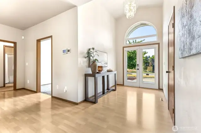 Natural light galore, from the very entrance of the home you can see the brightness, the unique and plentiful windows and vaulted ceilings add to the treasure that is this 1-story home.