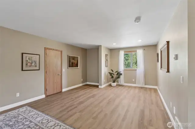 Another view of the expansive primary suite—flexible enough to become your own private living room, exercise space, or retreat.