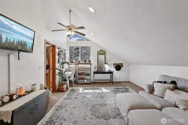Welcome to Wing 2 of the home, filled with natural light—featuring a spacious living room perfect for relaxing or entertaining.