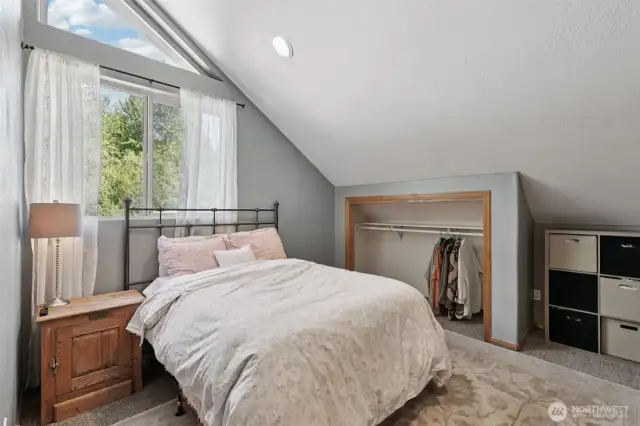Second bedroom located within the second wing of the home.