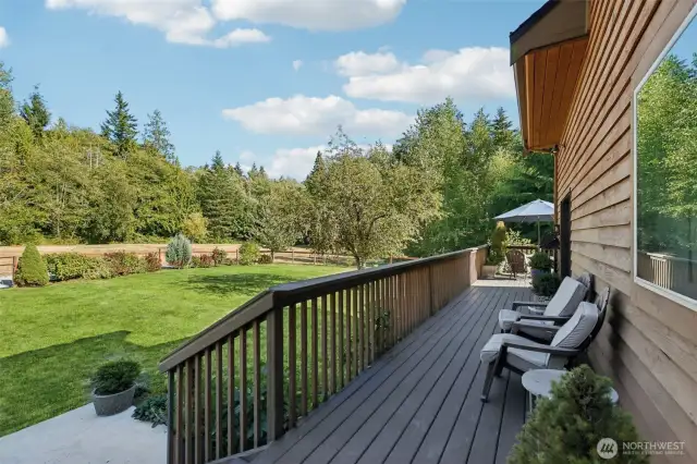 Privacy, quiet, and beauty can be found from this deck. From here, you can walk out to the many meandering trails or out to your fruit trees.