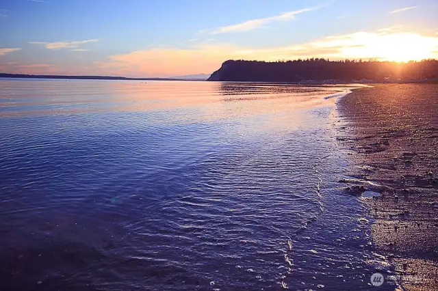 60 feet of waterfront with tideland rights. PLUS Useless Bay State Park is just down the street for miles and miles of beach combing.