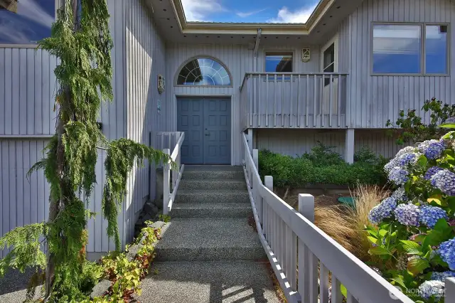 Welcome home to this spacious well-built custom home on a sandy beach!