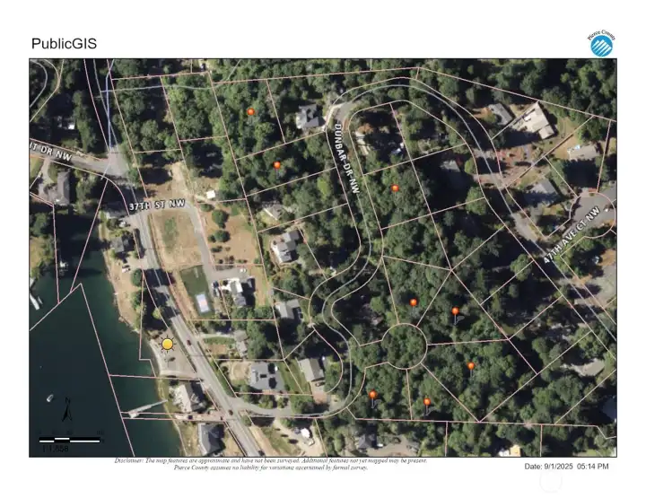 Pins indicate included lots. Sun icon to the left indicates location of Dunbar Cove private waterfront along East Bay Drive.