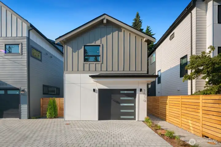 From the street, this is the Carriage House. The detached home sits behind.