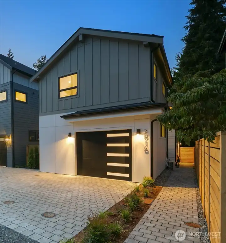 From the street, this is the Carriage House. The detached home sits behind.