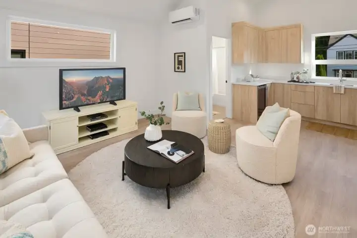 The carriage house has a family room area, full bath and kitchenette.