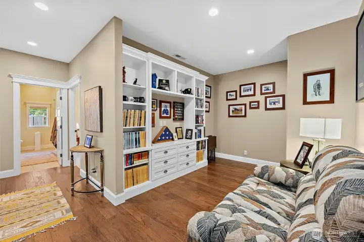 Library/Den/Media or play room just off living room