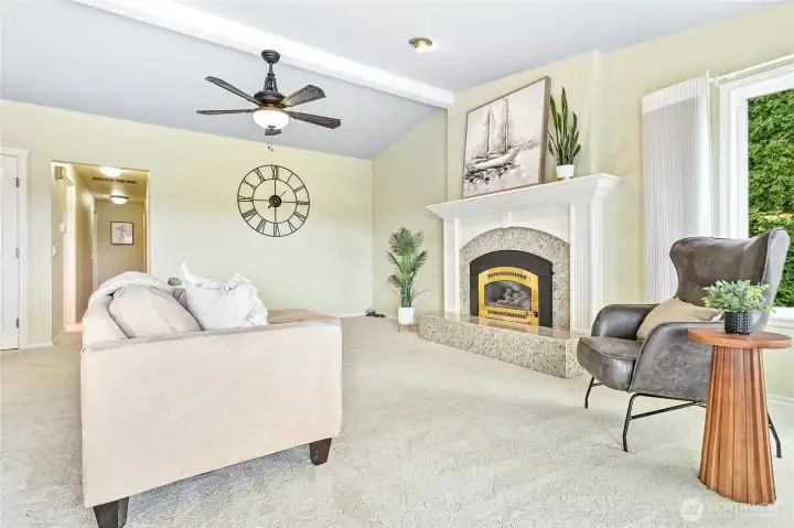 The opening on the left leads to the bathroom and 3 bedrooms.