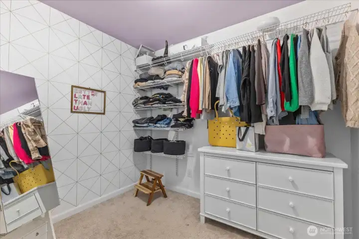 Custom walk-in closet off the primary bathroom